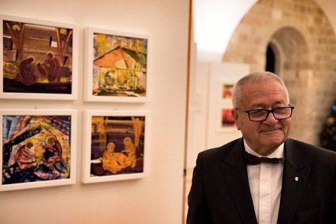 Un pintor volcado en una Navidad de tonos rojos y trazo simple: Tonino Maurizi expone en Jerusalén